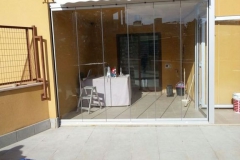 Cerramiento de porche con cortina de vidrio en Hospitalet de l'Infant